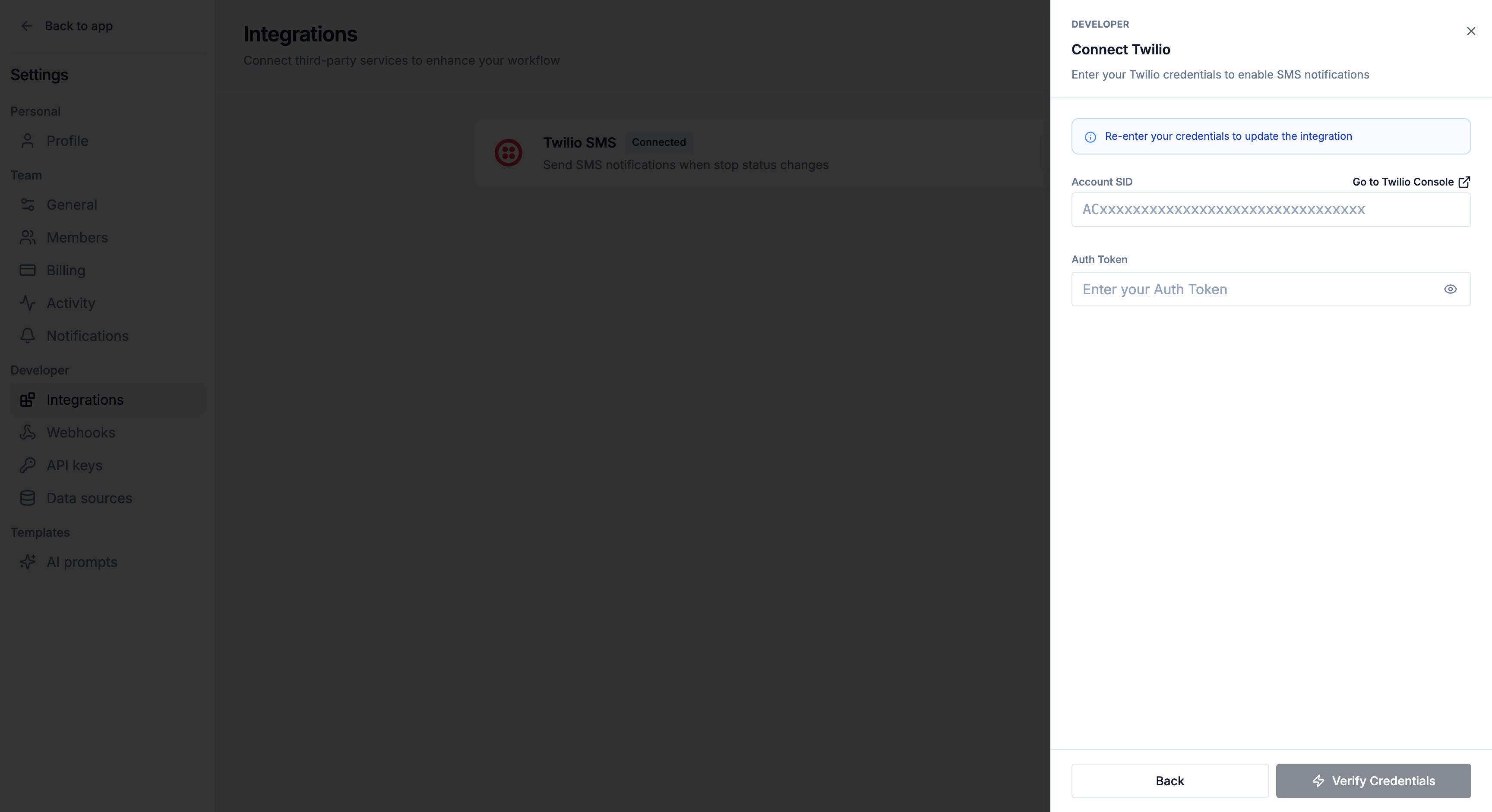 The Connect Twilio sheet on the credentials step, with the Account SID and Auth Token fields