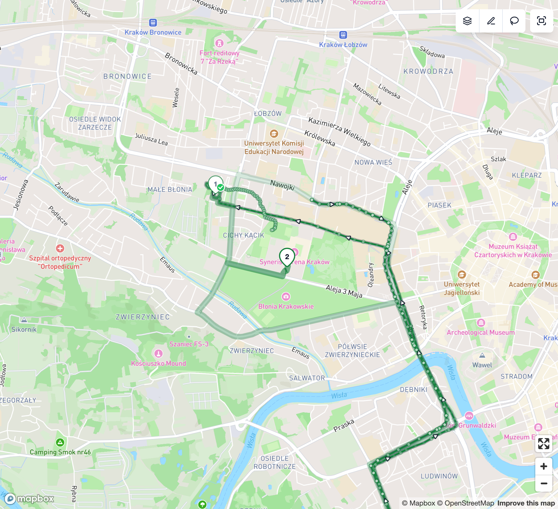 A finished route up close: the recorded track, with arrows for direction, follows the streets over the paler planned route; the delivered first stop is faded with a check