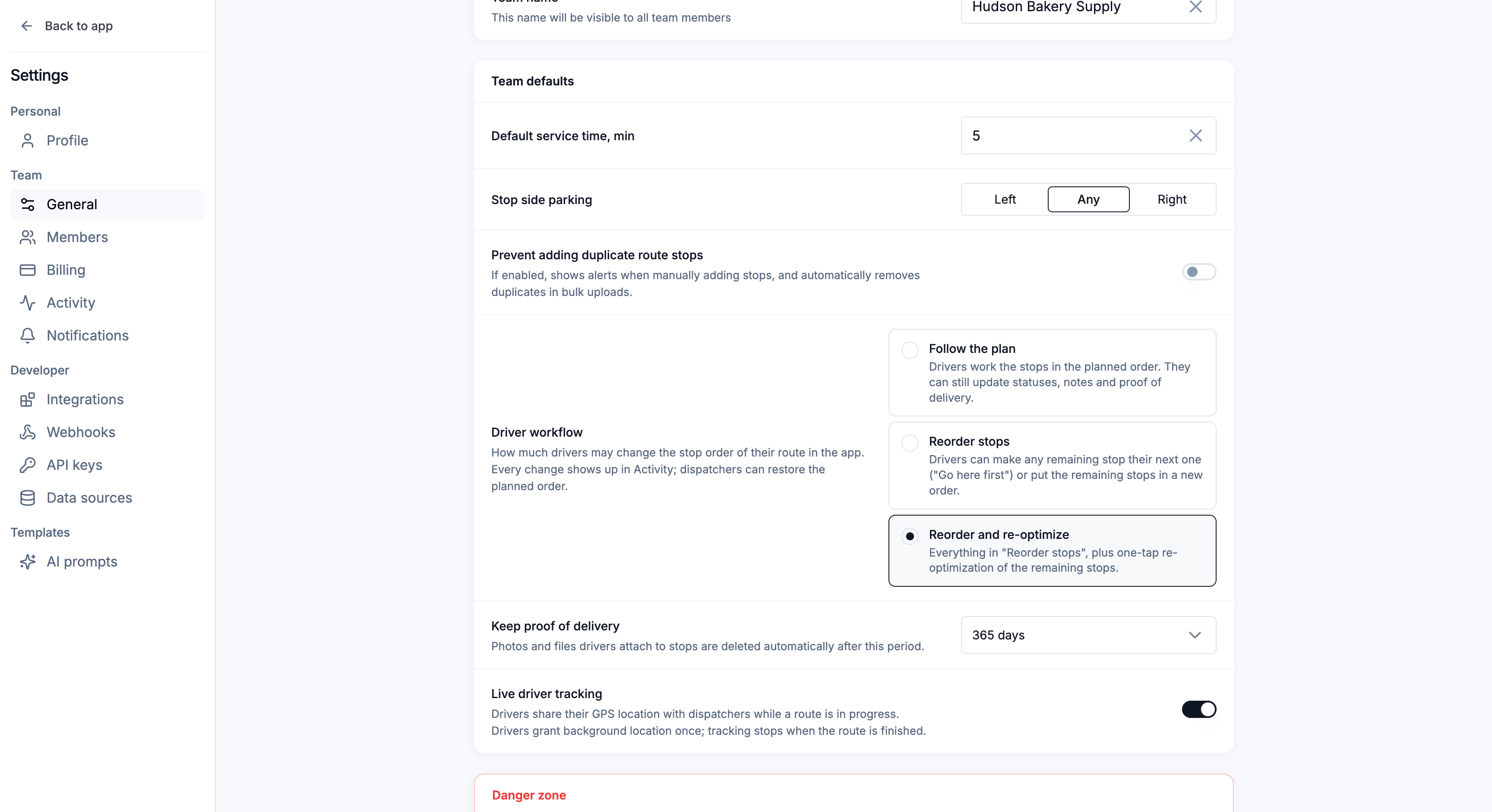 Settings → General with the Team defaults card — service time, stop side parking, duplicate prevention