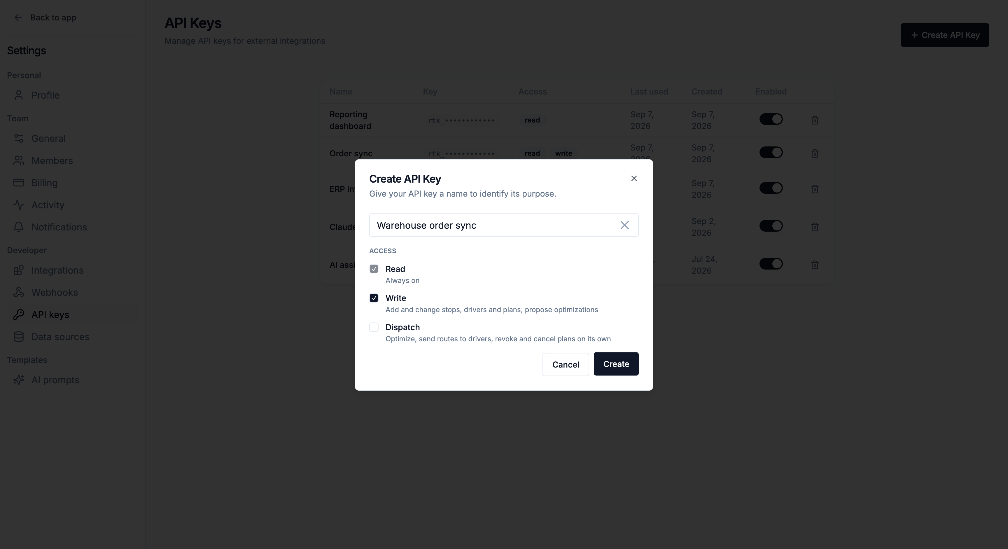 The Create API Key dialog with Read always on, Write and Dispatch, over the key table with access badges