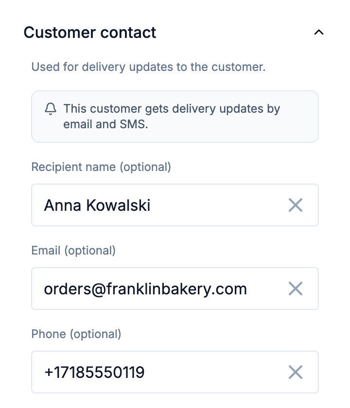 A stop's Customer contact with email and phone, and the line saying the customer gets updates by email and SMS