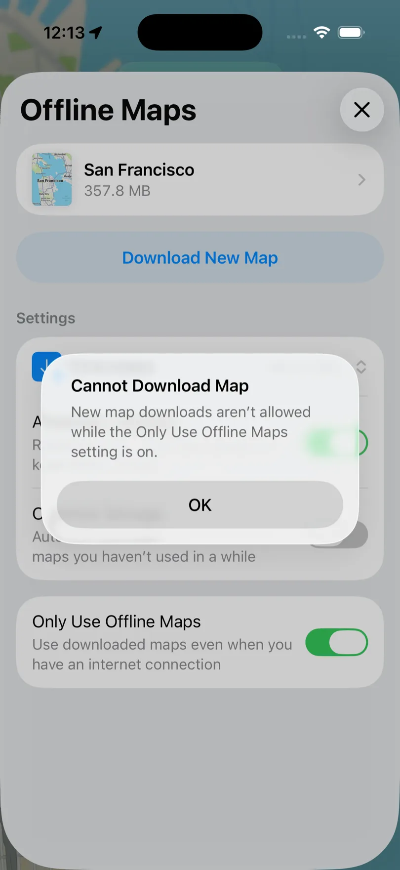 Aviso de Apple Maps indicando que no se pueden descargar mapas nuevos mientras Solo usar mapas sin conexión está activado