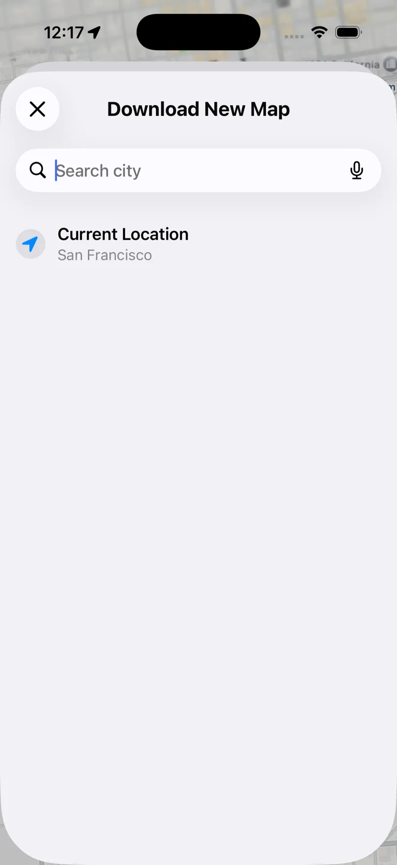 Pantalla Descargar mapa nuevo de Apple Maps con el campo Buscar ciudad y la opción Ubicación actual